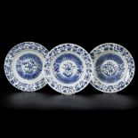 A set of (3) deep porcelain plates with floral decoration, China, Kangxi.