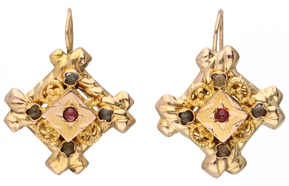 14K. Yellow gold antique earrings set with rhinestones.