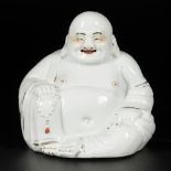 A porcelain Buddha, China, Republic period.