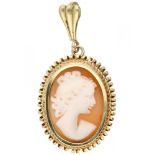 Cameo pendant in a 14K. yellow gold frame with cord rim.