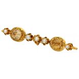 14K. Yellow gold antique brooch set with yellow topaz and seed pearl.