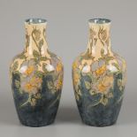 J.W. Mijnlieff (Jutphaas 1862 - 1940 Scheveningen), a set of vases with polychrome stylized floral d