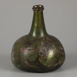 A wine bottle of green iridescent glass, so called 'kattekop', Dutch, 18th century.