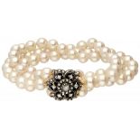 Three-row vintage freshwater pearl bracelet with rose cut diamonds set in 14K. yellow gold / silver