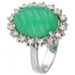 14K. White gold entourage ring set with approx. 5.62 ct. chrysoprase and approx. 0.32 ct. diamond.