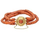 Three-row red coral vintage bracelet with a 14K. yellow gold closure.