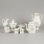 A porcelain coffee/tea set with cornflower decorations, France, early 19th century.