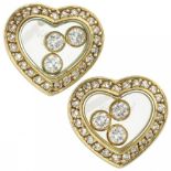 18K. Yellow gold Chopard Happy Diamonds heart-shaped earrings set with approx. 0.49 ct. diamond.