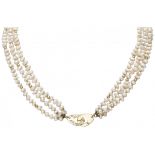 Freshwater pearl necklace with 18K. yellow gold details set with approx. 0.16 ct. diamond.
