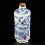 A porcelain iron-red snuff bottle decorated with playing kids around a fish bowl, China, 19th centur