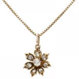Vintage 14K. yellow gold necklace and flower-shaped pendant set with diamond.