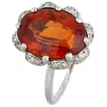 14K. White gold entourage ring set with approx. 7.30 ct. citrine and approx. 0.24 ct. diamond.