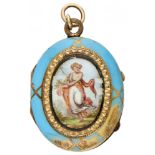 14K. Yellow gold medallion pendant with blue enamel.