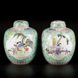 A set of (2) porcelain lidded jars with famille rose decoration, marked Guangxu, China, Republic.