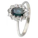 18K. White gold entourage ring set with approx. 0.76 ct. natural sapphire and approx. 0.48 ct. diamo