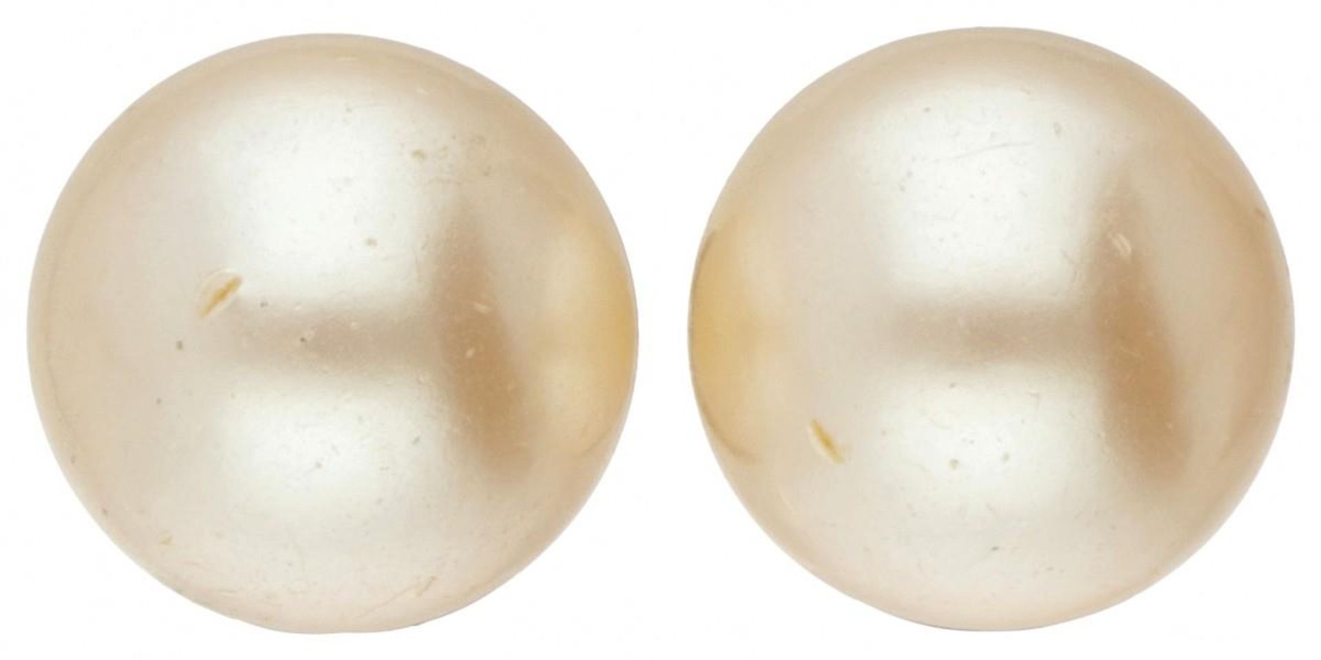 Silver clip earrings set with freshwater pearls - 835/1000.