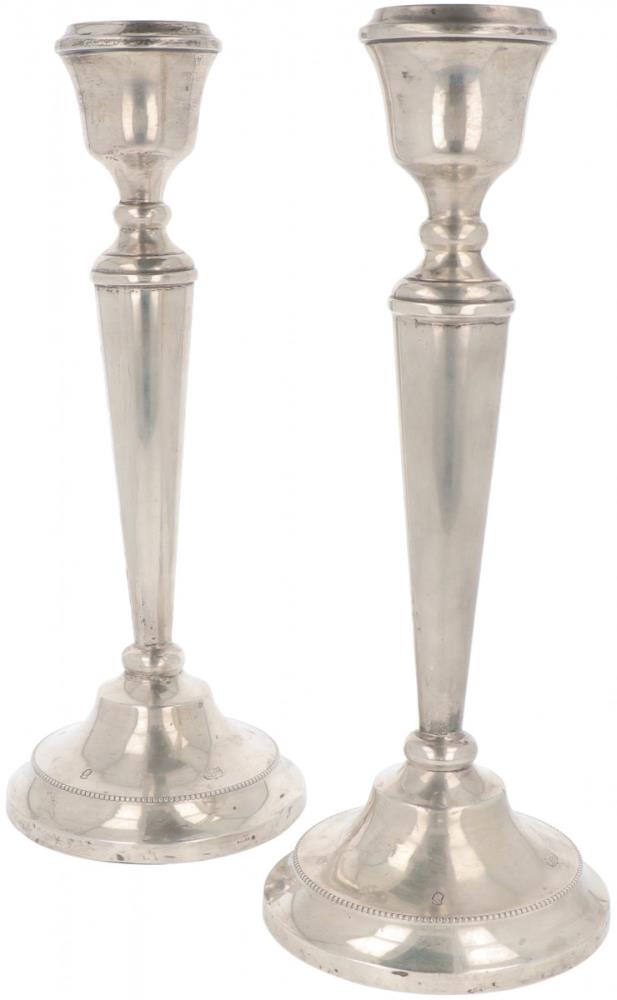 (2) piece set of table candlesticks silver.