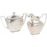 (2) piece creamer set silver.