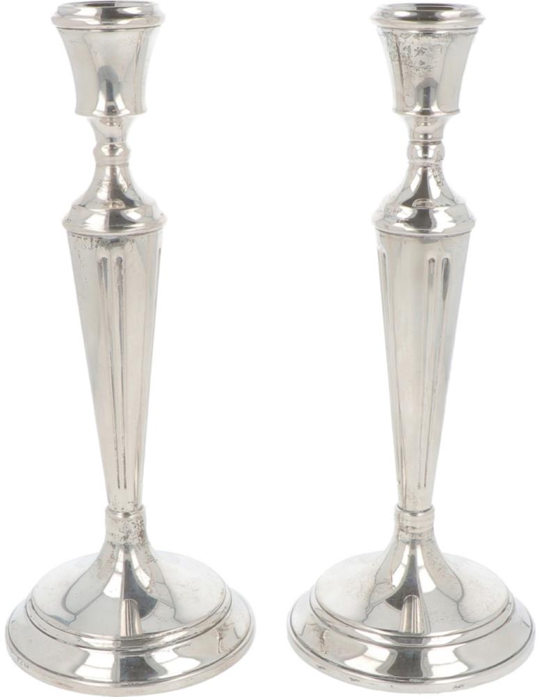 (2) piece set of table candlesticks silver.