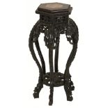 A Chinese blackened hardwood plant table, 20th century.