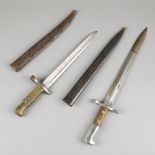 A Spanish Mauser bayonet, together with a French Yatagan bayonet, 1st half 20th century.