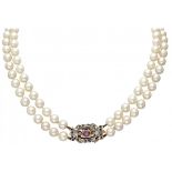 Two-row freshwater pearl necklace with 14K. yellow gold and silver closure set with approx. 0.56 ct.