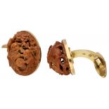 14K. Yellow gold cufflinks set with carved Chinese hediao nut.