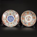 A lot comprised of (2) porcelain chargers with floral decorations, Japan, late 19th century.