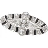 14K. White gold openwork Art Deco brooch set with rose cut diamonds and onyx.