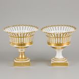 A set of (2) Empire gilt porcelain coupes, France, 1st half 19th century.