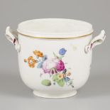 A porcelain cachepot decorated with flowers, marked Höchst, Germany, 18th century.