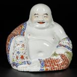 A porcelain Buddha with famille rose decor, China, 1st half 20th century.