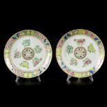 A set of (2) porcelain Canton famille rose chargers for the Islamic market, China, 19th century.