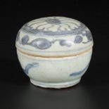 A porcelain lidded box with floral decorations, China, Ming.