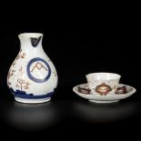 A porcelain jug Aqua and porcelain Imari cup and saucer Japan, 18th century.