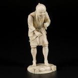An ivory sculpture in the shape of a fisherman, Japan, late Meji period.