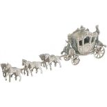 Miniature royal carriage with six horses in silver.