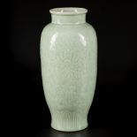 A porcelain celadon vase with floral decoration, China, 19th century.