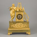 A large fire-gilt bronze Charles X mantle clock with Orpheus and his lyre, Frankrijk, a. 1830.