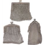 (3) piece lot of silver bracket purses.
