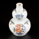 A porcelain famille verte gourd model snuff bottle decorated with flowers, marked Wanli, China, 19th
