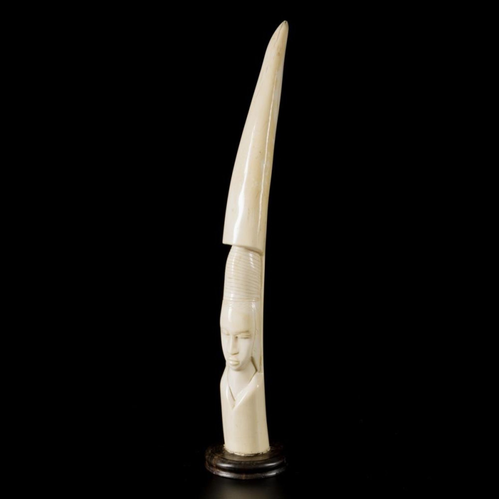An ivory carved tooth, D.R Congo, 1930.