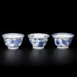 A lot of (3) porcelain cups, two with floral decoration and bird, one with hare and floral decoratio