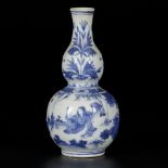 A porcelain gourd-shaped vase with decor of figures in garden and tulips, China, Transition.