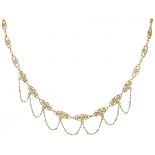 18K. Yellow gold filigree link necklace set with seed pearls.