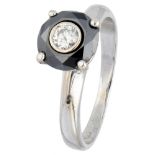 18K. White gold ring set with approx. 0.12 ct. diamond and black stone.