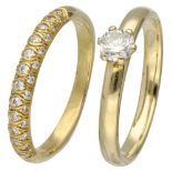 Set of a 14K. solitaire ring and an 18K. stacking ring, both set with diamonds.