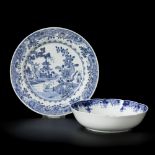 A porcelain colander plate and a porcelain plate with landscape decor, China, 18th century.
