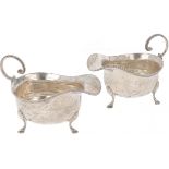 (2) piece set of sauce boats, silver.