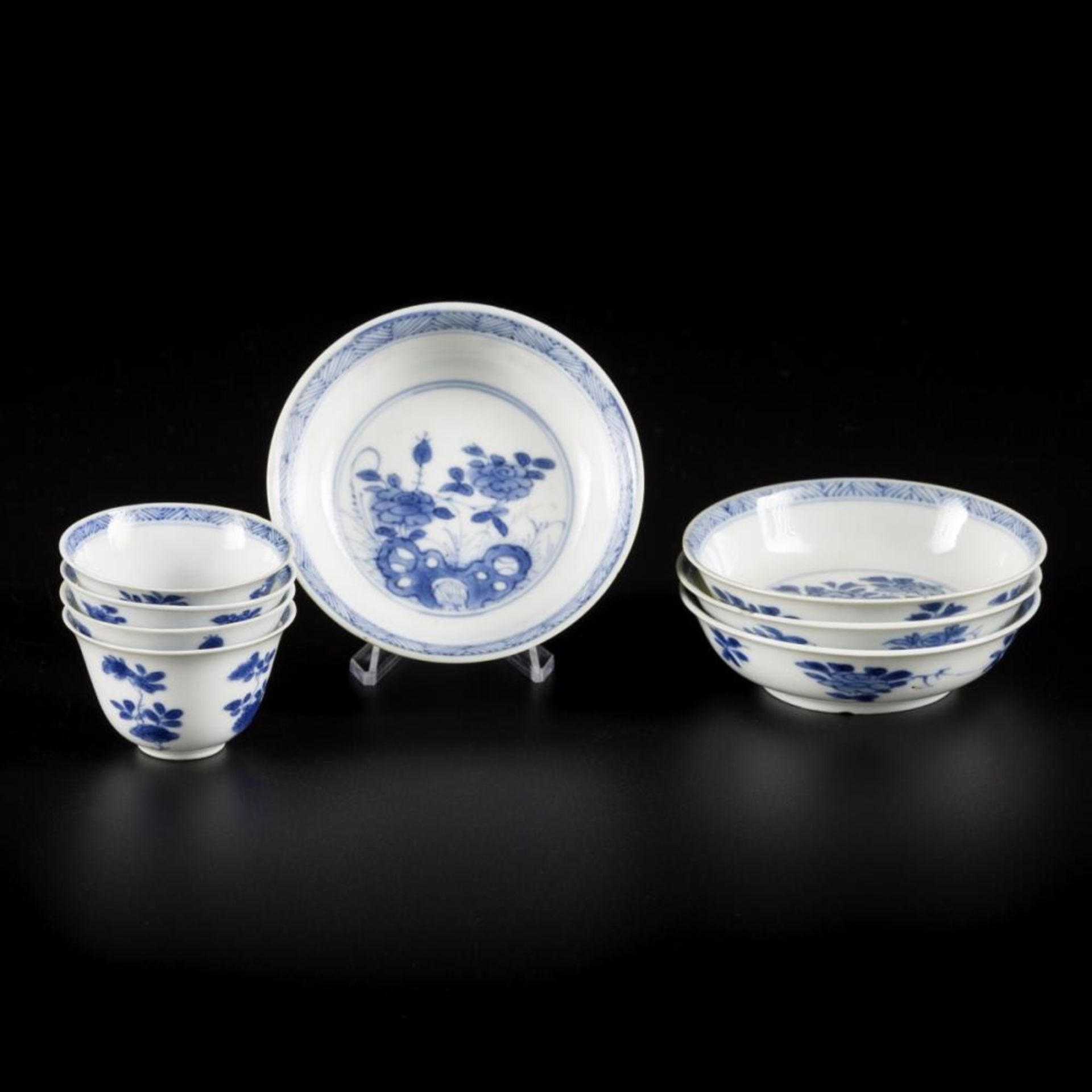 A set of (4) porcelain miniature cups and saucers with floral decoration, China, Kangxi.